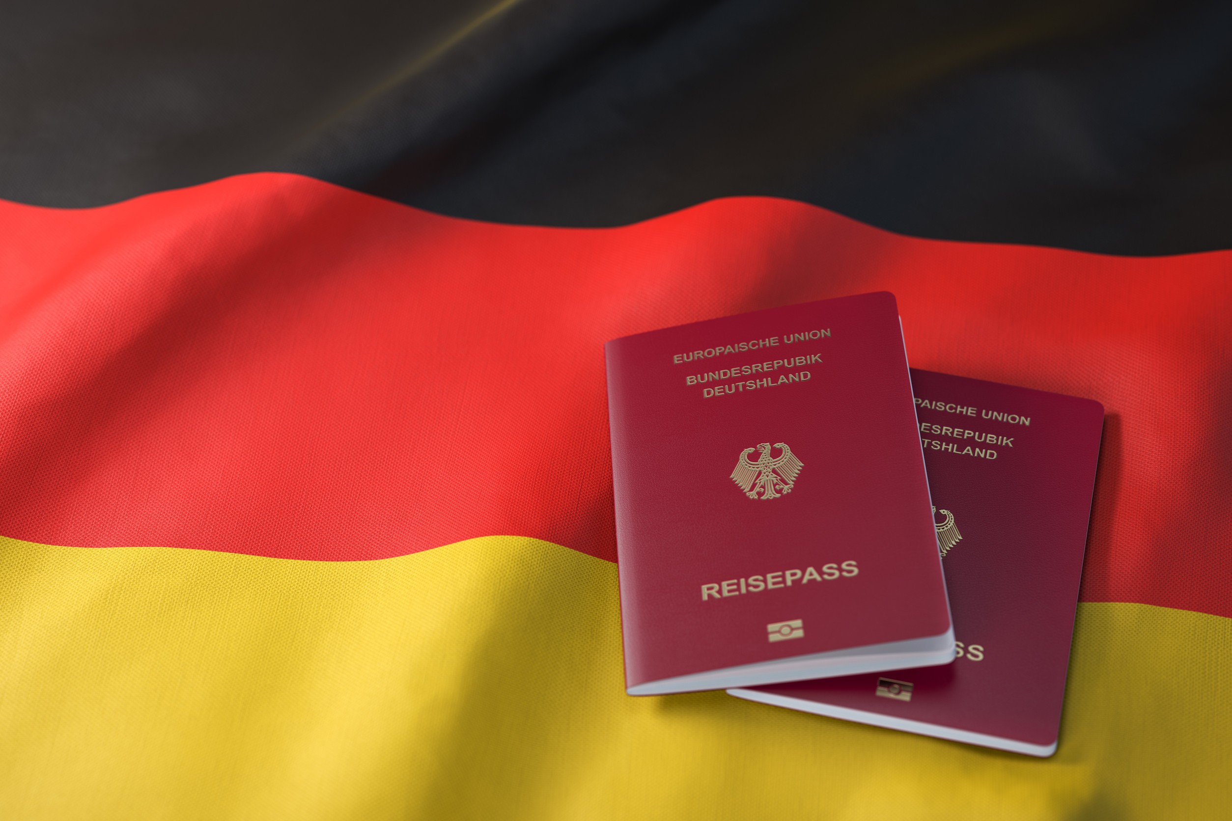 German passports placed on national flag